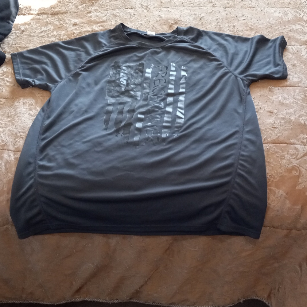 Freightliner  t-shirt (buy 1 or two shirts) One is  a XXL, and the one, medium.